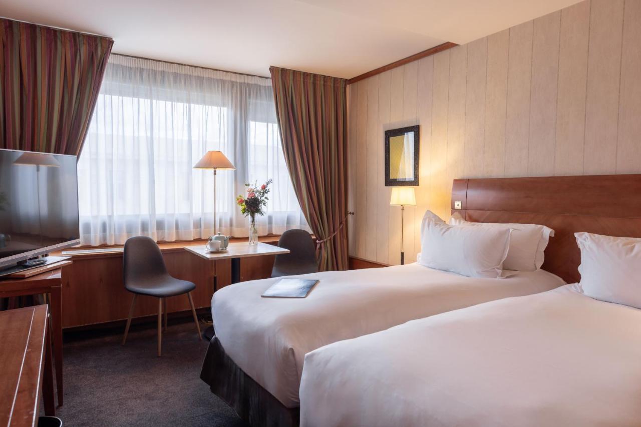 Hotel Sofitel Lyon Bellecour Exterior foto A typical room at the hotel